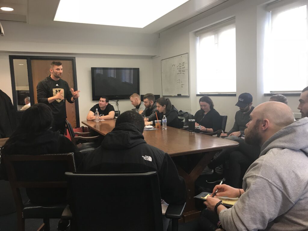 Brian Cain doing a weekly review with staff at Yale University.