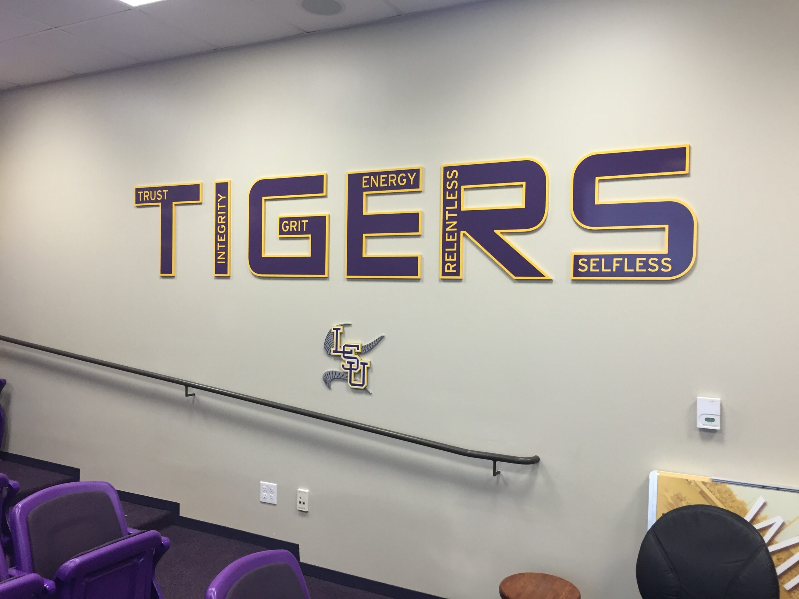 LSU Softball Core Principles of TIGERS in their team meeting room